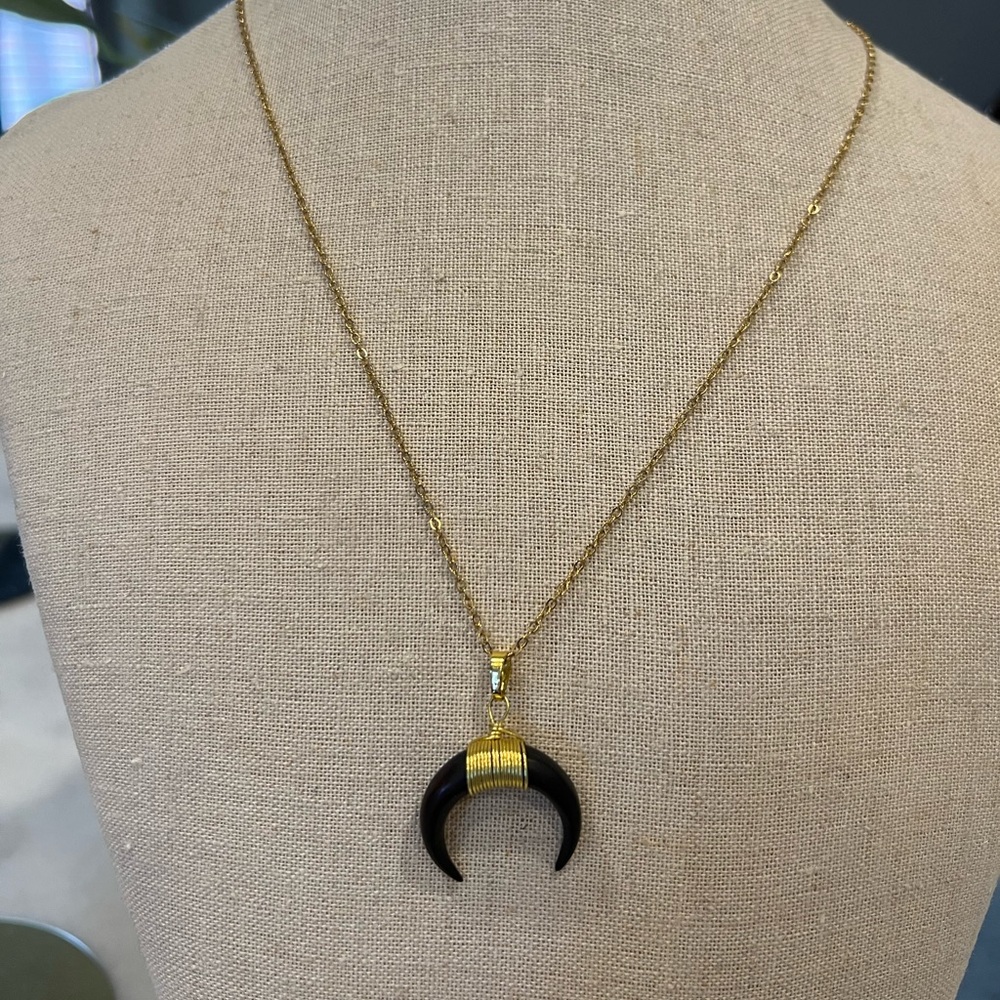 Gold and black half moon necklace